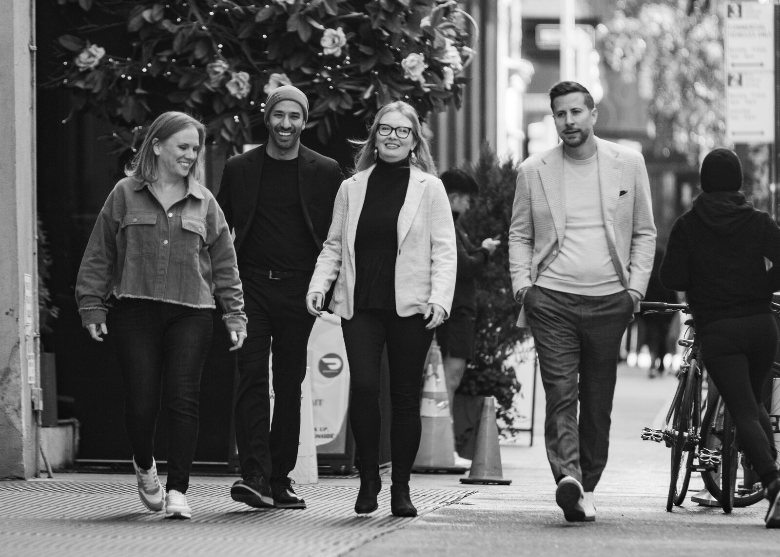 The Summer Friday team walking together along a city sidewalk